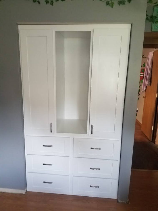 Built in closet cabinets.